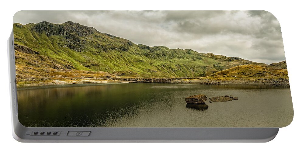 Landscape Portable Battery Charger featuring the photograph A Rock and a Hard Place by Nick Bywater