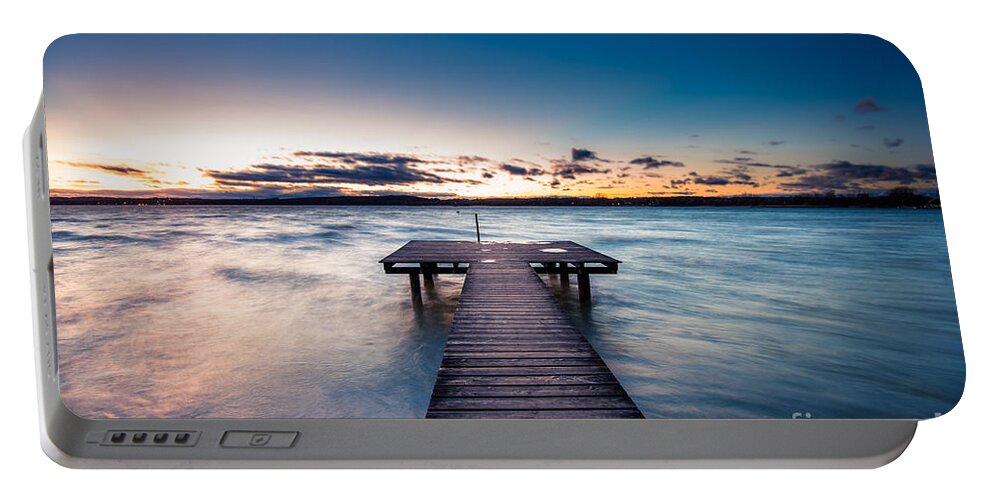 Ammersee Portable Battery Charger featuring the photograph A Stormy Day Ends by Hannes Cmarits