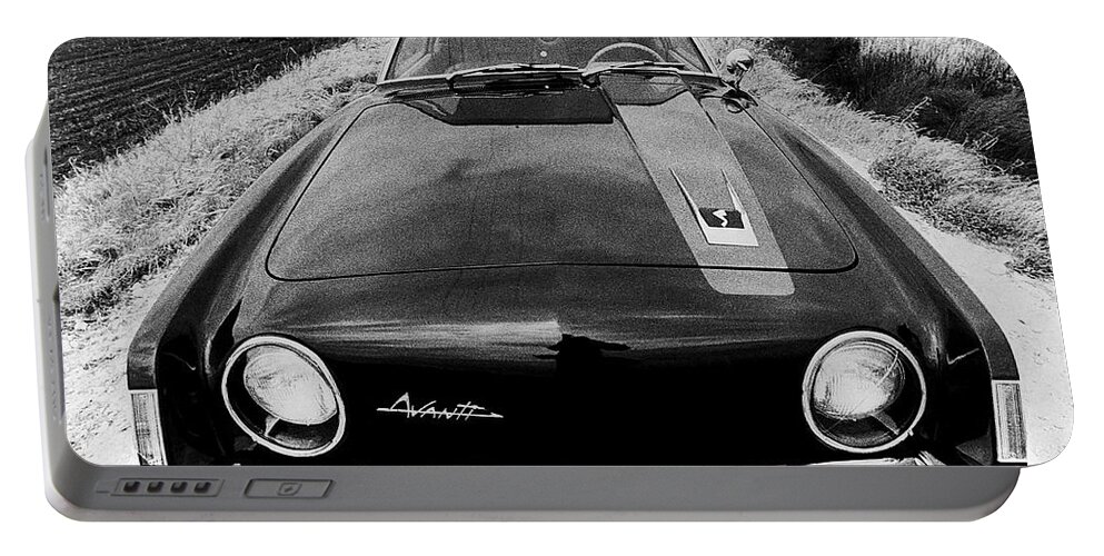 1970's Portable Battery Charger featuring the photograph A Studebaker Avanti by Underwood Archives