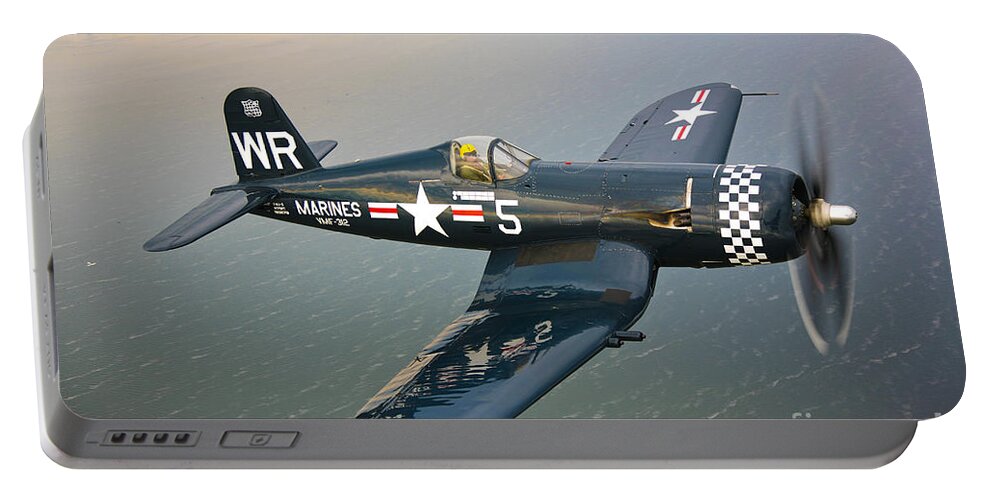 Transportation Portable Battery Charger featuring the photograph A Vought F4u-5 Corsair In Flight by Scott Germain