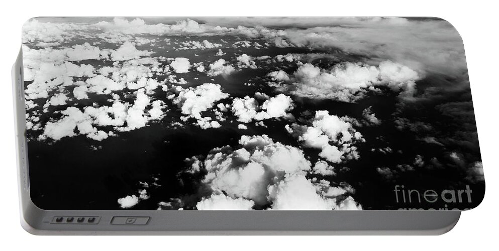Flying Plane Portable Battery Charger featuring the photograph Aerial Clouds bw by Alex Art