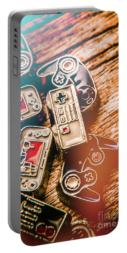 Gaming Portable Battery Charger featuring the photograph Antique gaming consoles by Jorgo Photography