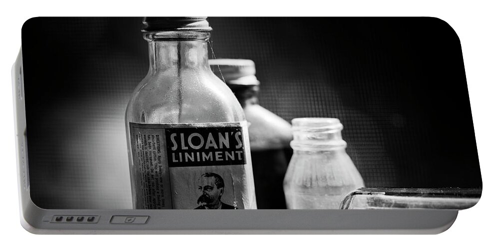 Blumwurks Portable Battery Charger featuring the photograph Apothecary by Matthew Blum