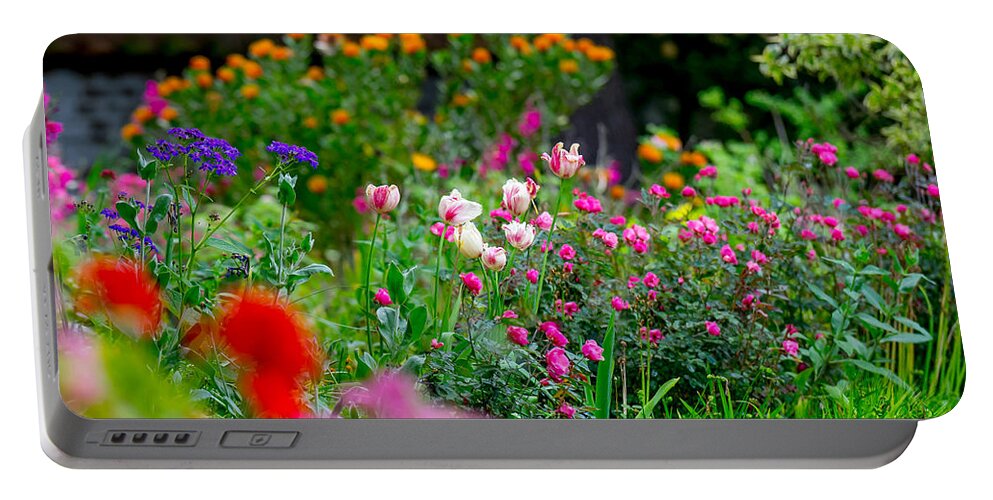 Garden Portable Battery Charger featuring the photograph April Flowers by Derek Dean