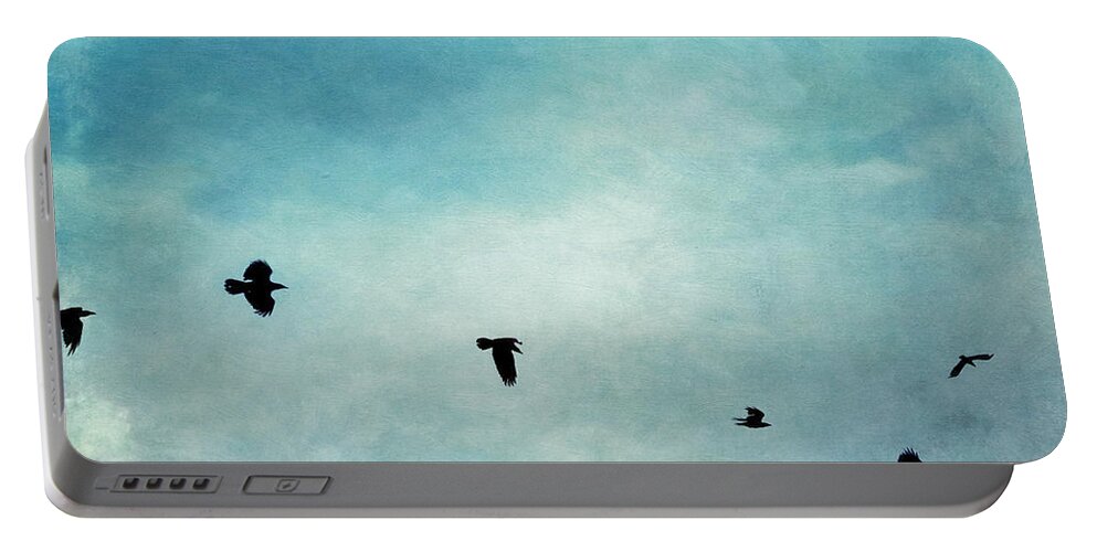 Clouds Portable Battery Charger featuring the photograph As the ravens fly by Priska Wettstein