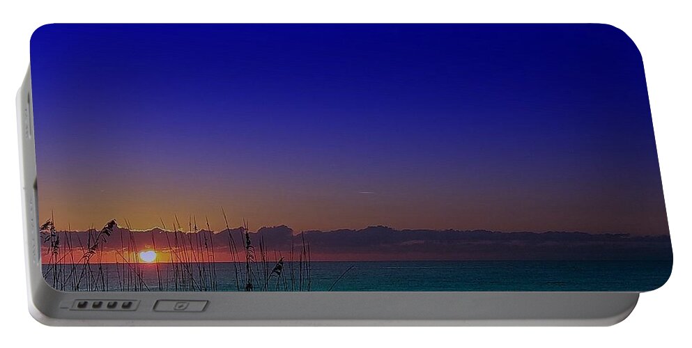 Sunrise Portable Battery Charger featuring the photograph BADBLUE sunrise by Robert Francis