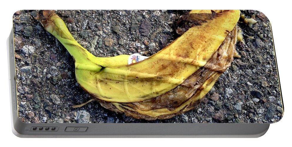 Banana Portable Battery Charger featuring the photograph Banana A Peel by Marlene Burns