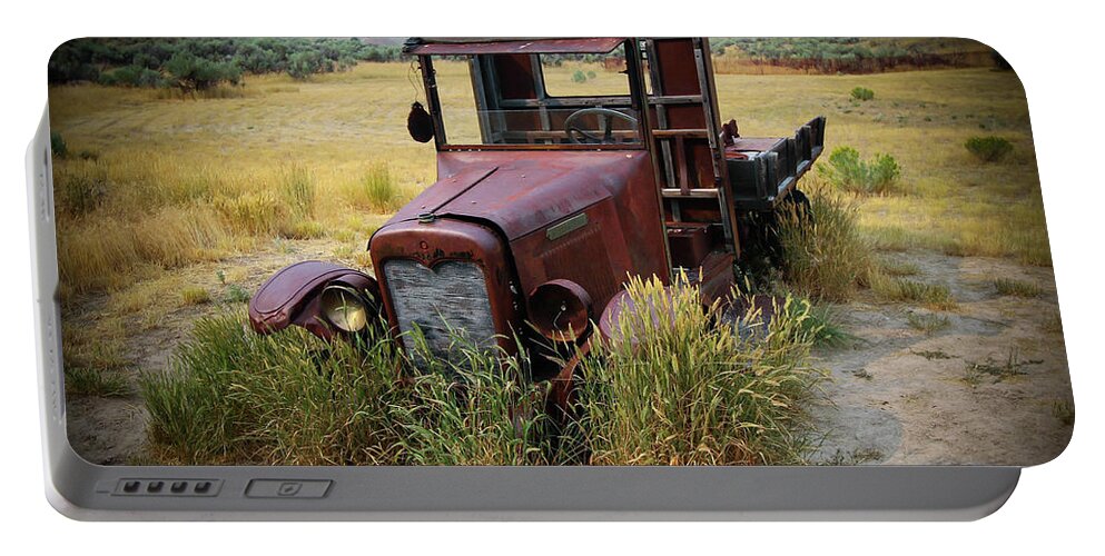 Bannack State Park Portable Battery Charger featuring the photograph Bannack Montana Old Truck Two by Veronica Batterson