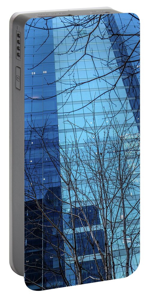 Architecture Portable Battery Charger featuring the painting Bare Tree branches in front of Glass Skyscraper by Judith Barath