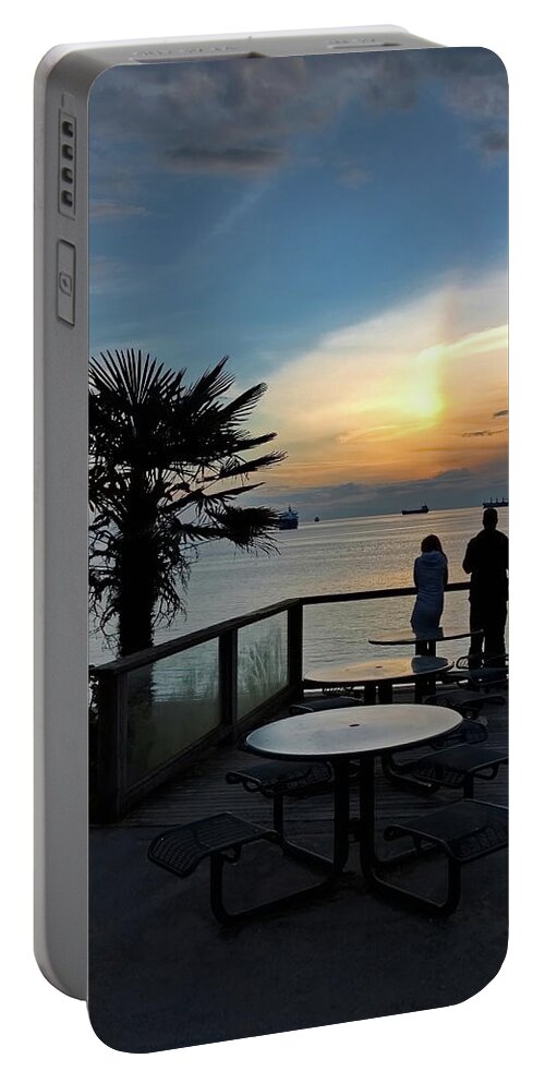 Alex Lyubar Portable Battery Charger featuring the photograph Beautiful sunset on the waterfront. by Alex Lyubar
