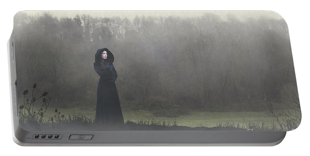Woman Portable Battery Charger featuring the photograph Beauty in the fog by Clayton Bastiani