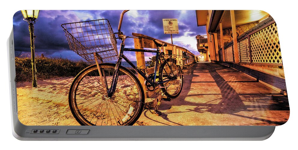 Atlantic Portable Battery Charger featuring the photograph Bike in Shadow by Debra and Dave Vanderlaan