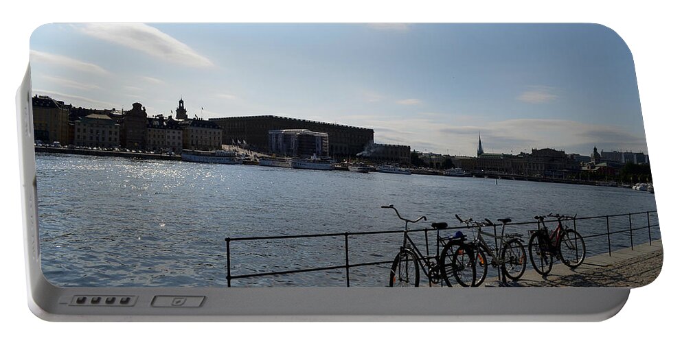 Bikes Portable Battery Charger featuring the photograph Bikes in Stockholm by Erik Burg