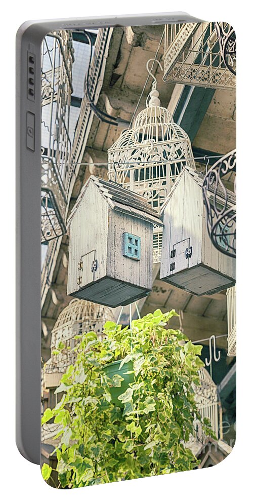 Nest Portable Battery Charger featuring the photograph Bird Boxes In Shop by Ariadna De Raadt