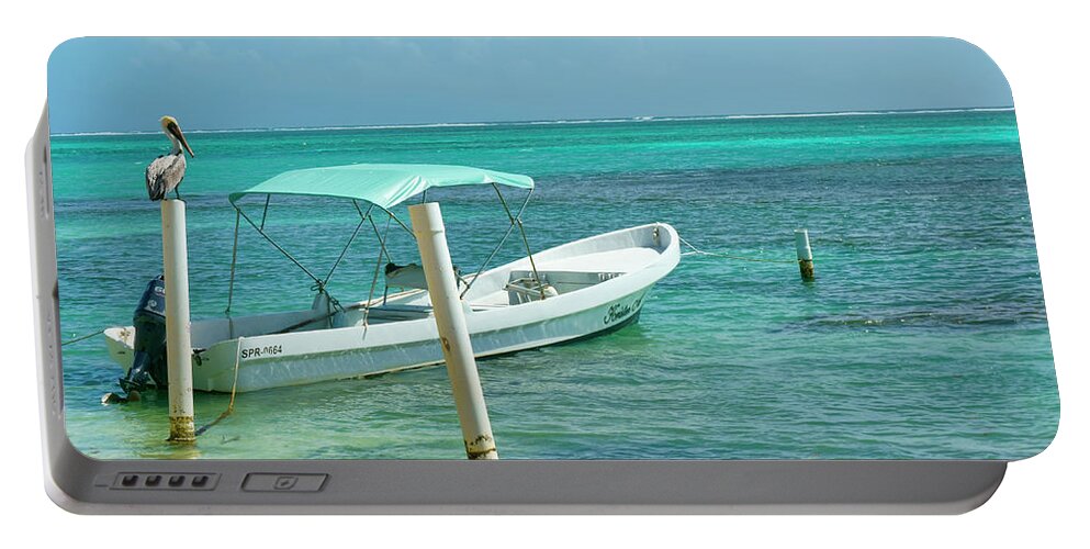 Belize Portable Battery Charger featuring the photograph Boat and Pelican on Ambergris Caye Belize by Waterdancer