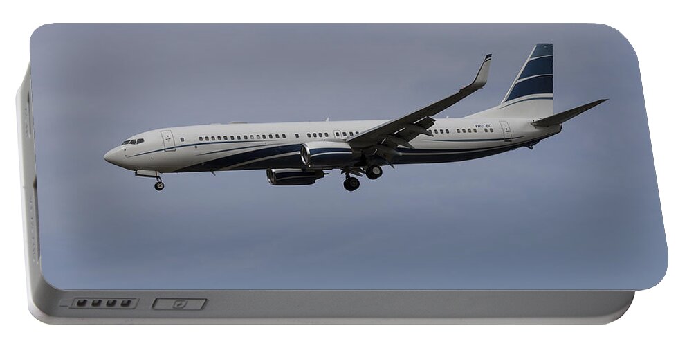 Boeing Portable Battery Charger featuring the photograph Boeing 737 Private Jet by David Pyatt