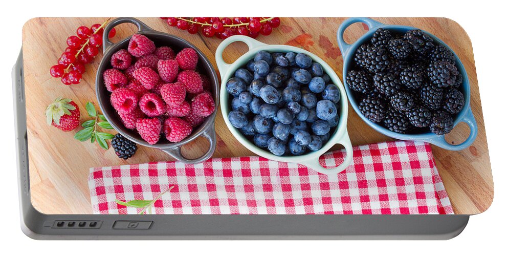 Berries Portable Battery Charger featuring the photograph Bowls of Beriies by Anastasy Yarmolovich
