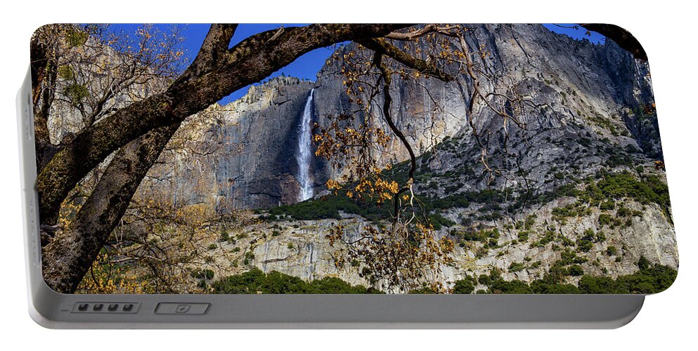 Fall Portable Battery Charger featuring the photograph Yosemite Falls framed by tree branch by Roslyn Wilkins