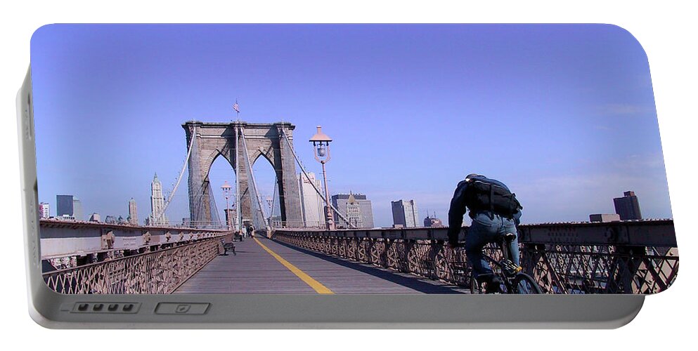 New York Portable Battery Charger featuring the photograph Brooklyn Bridge Bicyclist by Frank DiMarco