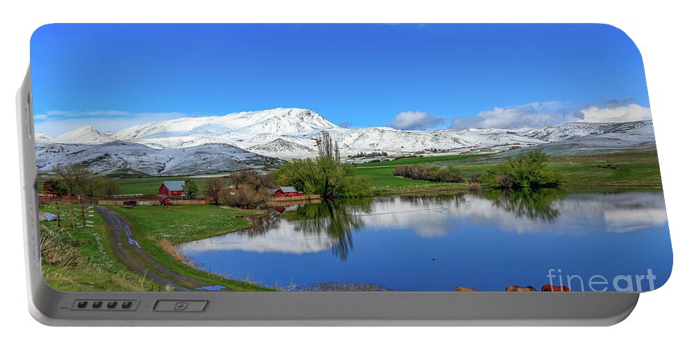 Ranch Portable Battery Charger featuring the photograph Butte Farm After Spring Snow by Robert Bales