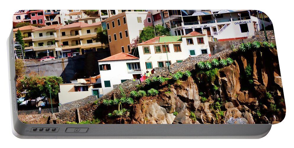 Fishing Portable Battery Charger featuring the photograph Camara de Lobos on the island of Madeira by Brenda Kean