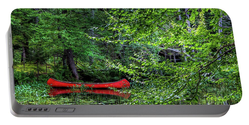 Canoe On The Shore Portable Battery Charger featuring the photograph Canoe on the Shore by David Patterson