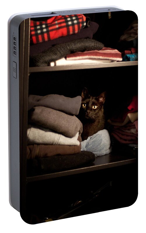 Cat Portable Battery Charger featuring the photograph Cat in the closet by Laura Melis