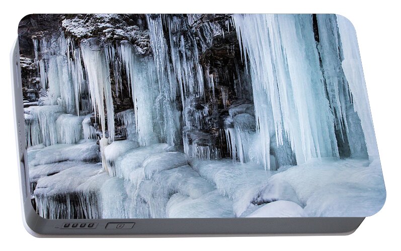 Abisko Portable Battery Charger featuring the photograph Caves of Ice by Alex Lapidus