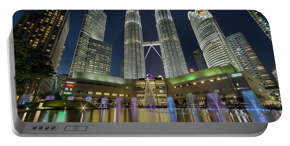 Klcc Portable Battery Charger featuring the photograph Christmas at KLCC by David Gn