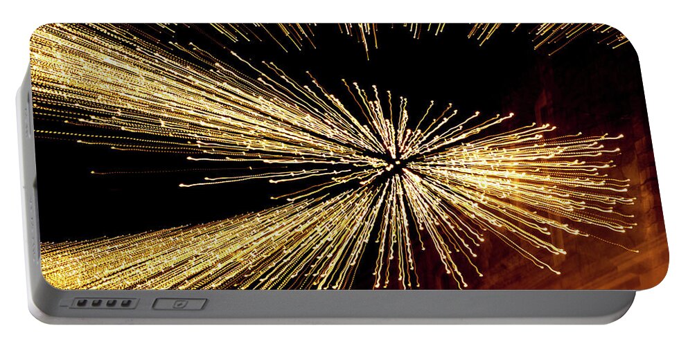 Helen Northcott Portable Battery Charger featuring the photograph Christmas Lights Zoom Blur ii by Helen Jackson