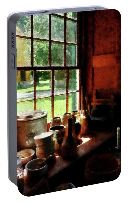 Jars Portable Battery Charger featuring the photograph Clay Jars on Windowsill by Susan Savad