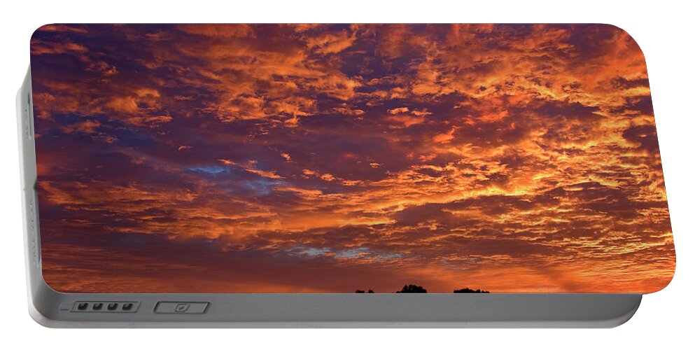Goldenl Sunrise Portable Battery Charger featuring the photograph Cloud Filled Sunrise by Sally Weigand