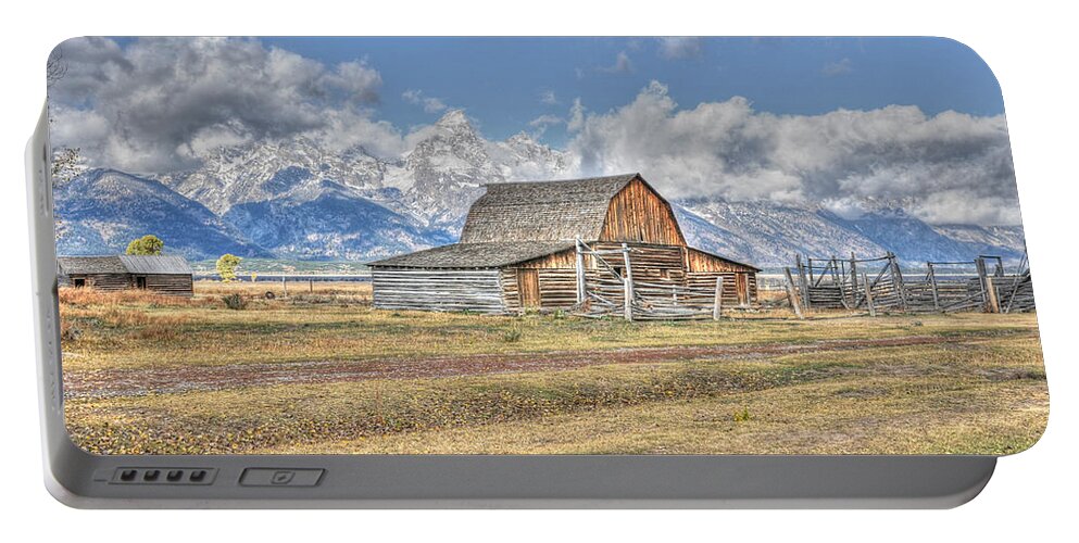 Teton Portable Battery Charger featuring the photograph Clouds and Barn by David Armstrong