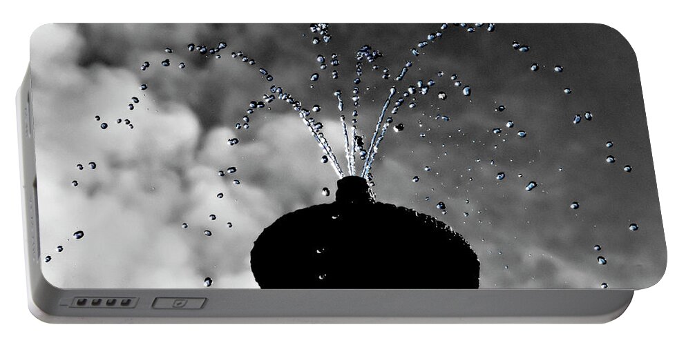 Fountain Portable Battery Charger featuring the photograph Color spreading fountain by Wolfgang Stocker