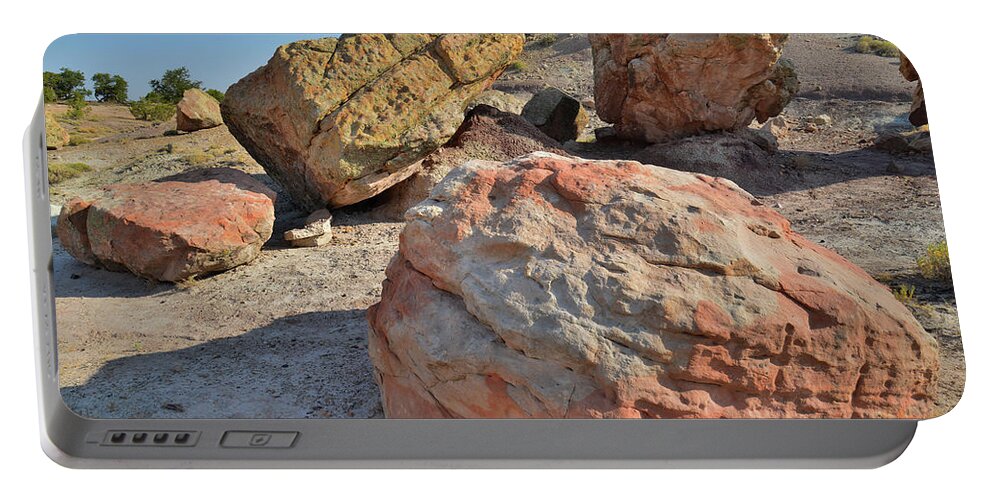 Grand Junction Portable Battery Charger featuring the photograph Colorful Boulders in the Bentonite Site on Little Park Road by Ray Mathis