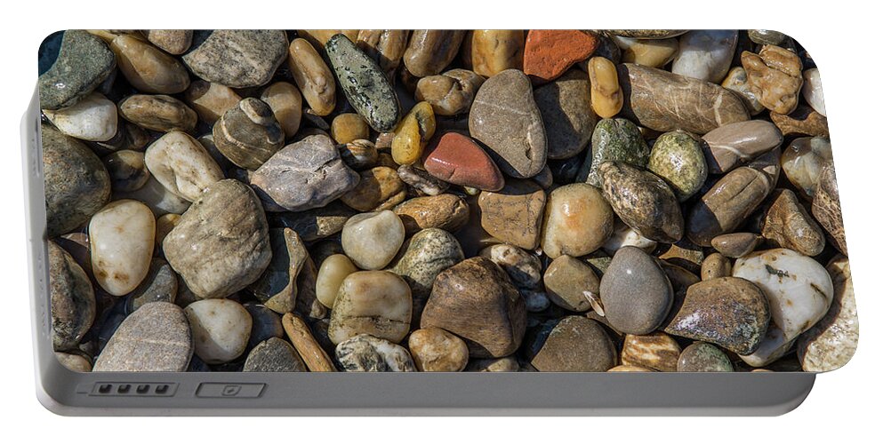 Stone Portable Battery Charger featuring the photograph Colorful Pebbles by Andreas Berthold