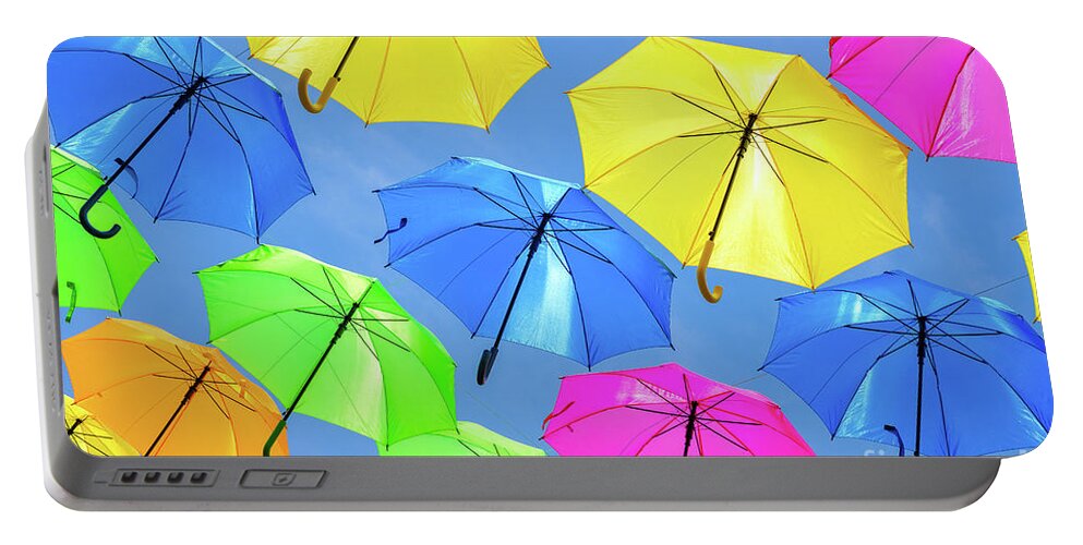 Umbrellas Portable Battery Charger featuring the photograph Colorful Umbrellas III by Raul Rodriguez