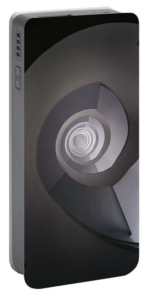 Spiral Staircase Portable Battery Charger featuring the photograph Concrete abstract spiral staircase by Jaroslaw Blaminsky