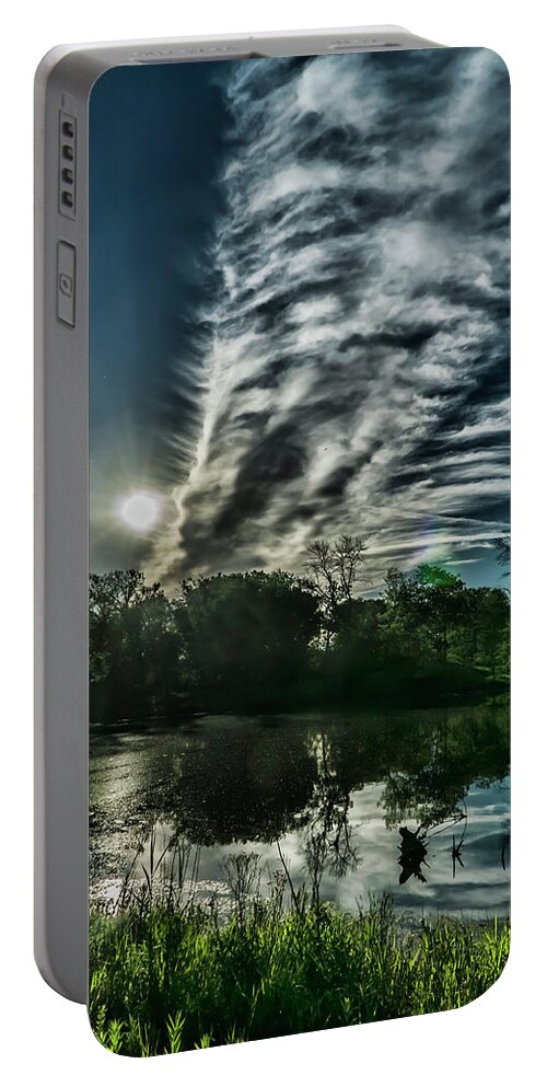 Cloud Portable Battery Charger featuring the photograph Cool looking cloud in the morning sun by Sven Brogren