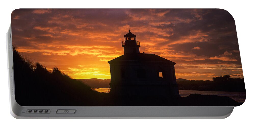 Bandon Portable Battery Charger featuring the photograph Coquille River Lighthouse Silhouette by Robert Potts