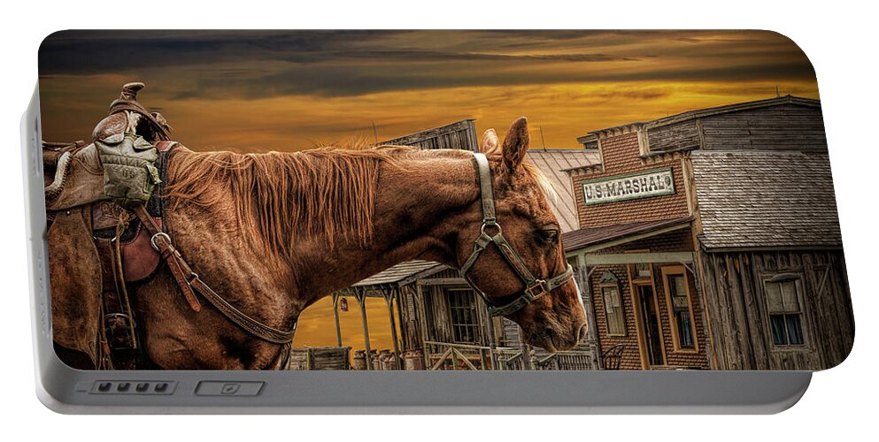 Saddle Portable Battery Charger featuring the photograph Cowboy Saddle Horse in front of the Marshall's Office by Randall Nyhof