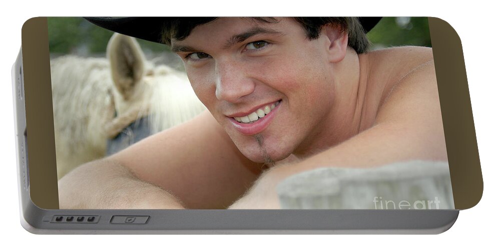 Handsome Portable Battery Charger featuring the photograph Cowboy Smile by Gunther Allen