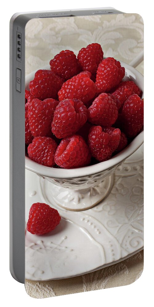 Raspberries Fruit Cup Food Berry Portable Battery Charger featuring the photograph Cup full of raspberries by Garry Gay