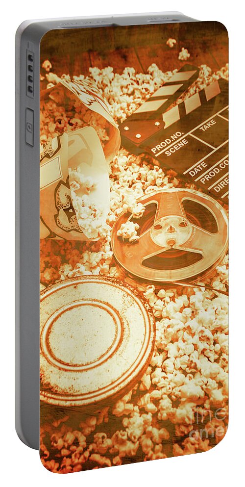 Vintage Portable Battery Charger featuring the photograph Cutting a scene of vintage film by Jorgo Photography
