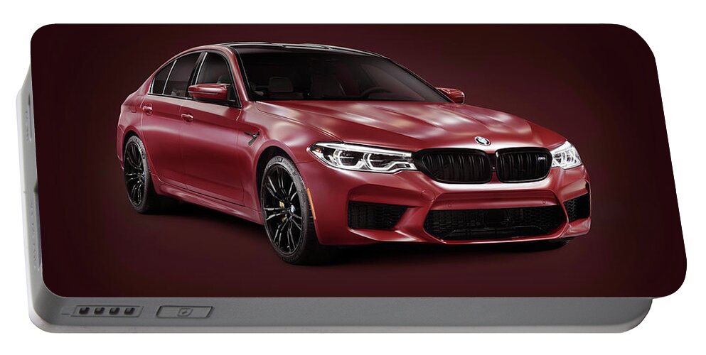 Bmw Portable Battery Charger featuring the photograph Dark red 2018 BMW M5 performance car sport sedan on burgundy bac by Maxim Images Exquisite Prints