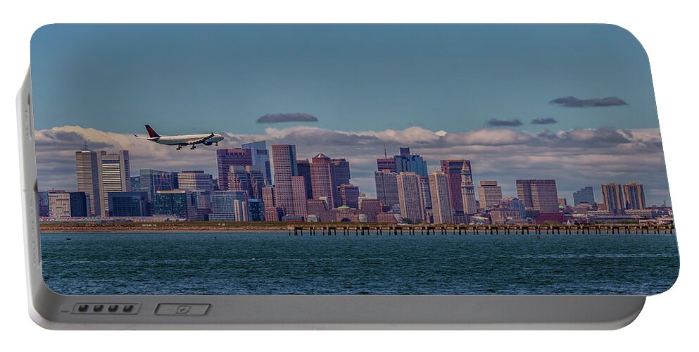 Delta Airlines Lands In Boston Portable Battery Charger featuring the photograph Delta Airlines Lands in Boston by Brian MacLean