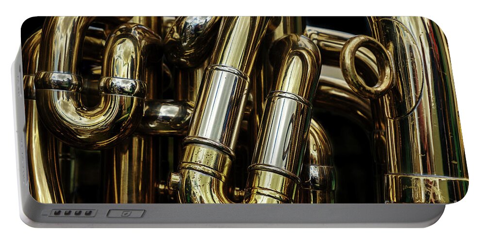 Tuba Portable Battery Charger featuring the photograph Detail of the brass pipes of a tuba by Jane Rix
