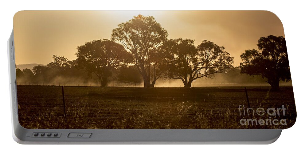 Sunset Portable Battery Charger featuring the photograph Dirtbike Dust by Linda Lees