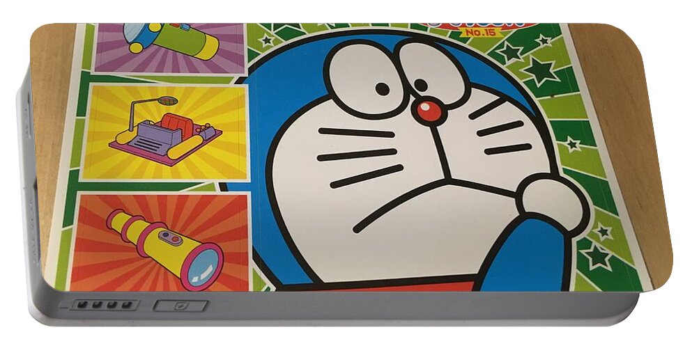 Doraemon Portable Battery Charger featuring the photograph Doraemon Gadget cat from the future by Yoshihisa Ito