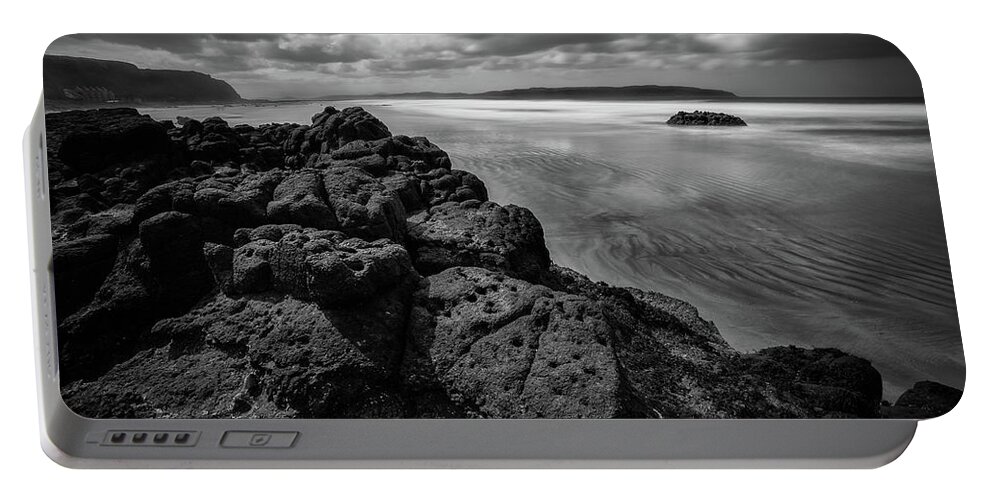 Downhill Portable Battery Charger featuring the photograph Downhill Rocks by Nigel R Bell